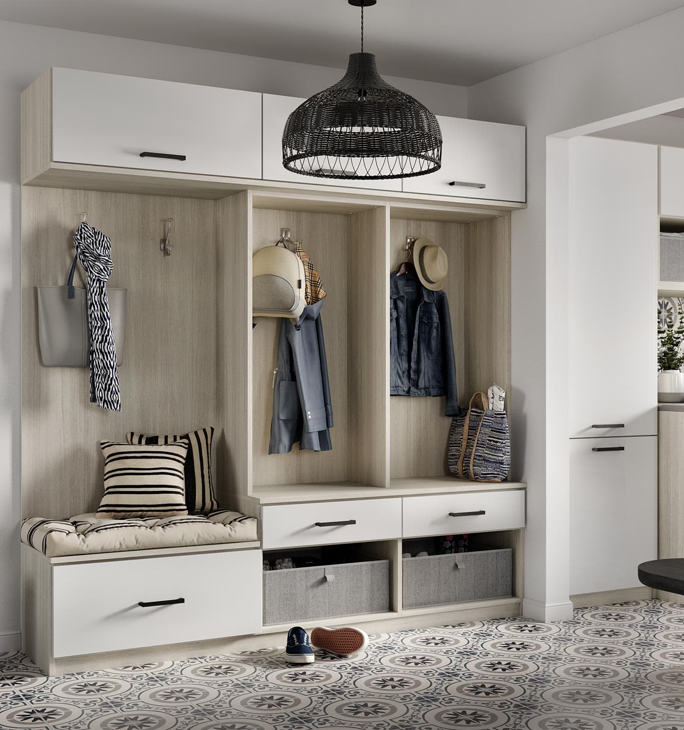 Mudroom custom storage solutions with hooks for hanging space by California Closets