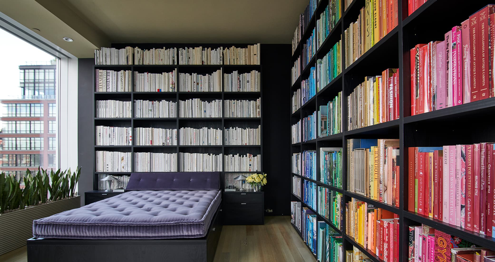 Kevin Sharkey's NYC skyrise condo with custom library bookshelves created by California Closets