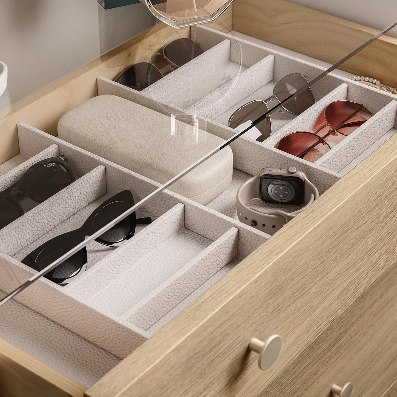 Closet organizer accessories with custom built drawer for sunglasses in a leather finish design by California Closets