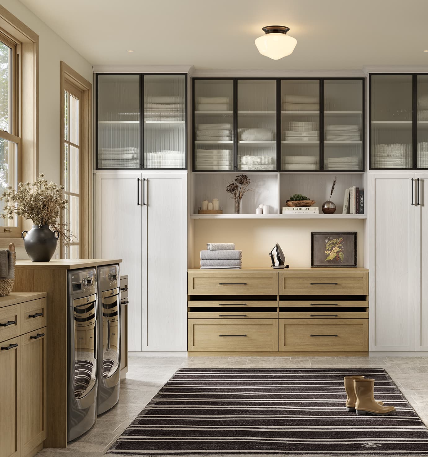 Laundry room with extra storage space for mudroom designed by California Closets