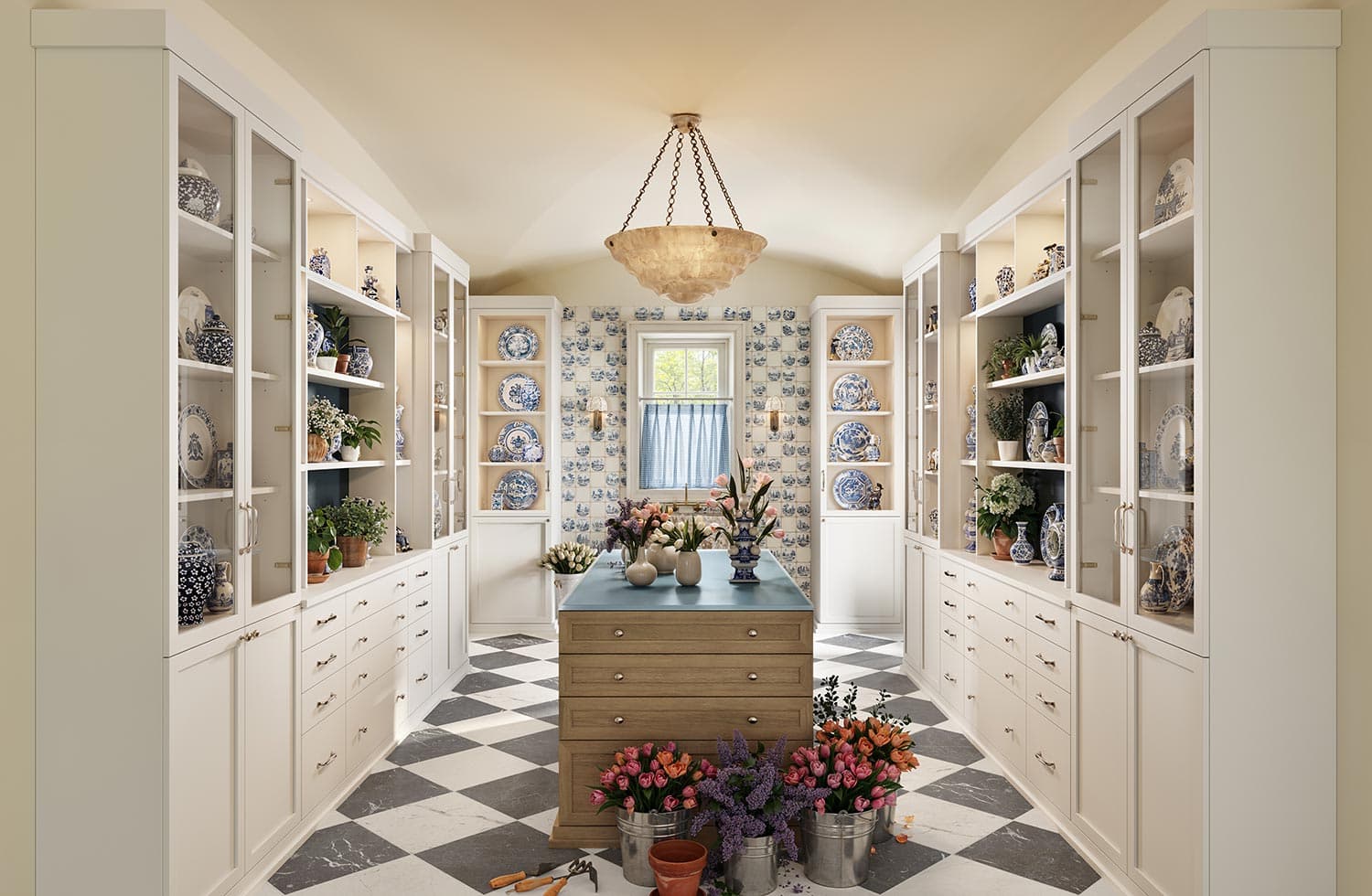Customized large kitchen pantry room with built in hutch drawers by California Closets