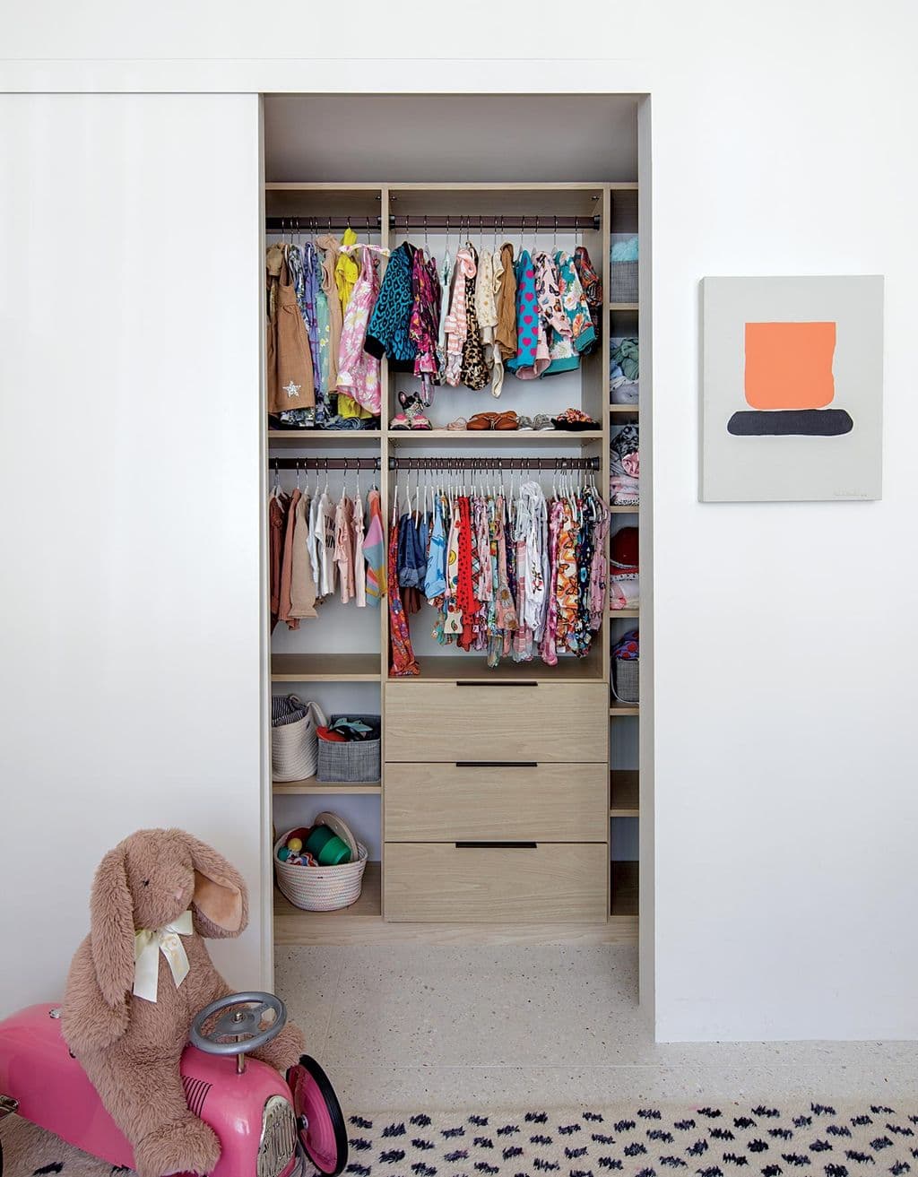 Custom kids walk in closet for Matt Sorum and Ace Harper created by California Closets